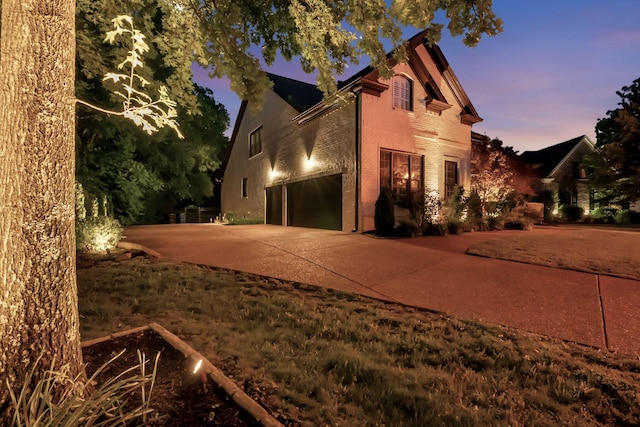 106 Ashton Park Blvd, Franklin, TN 37067 - view of side of home with concrete driveway and brick siding