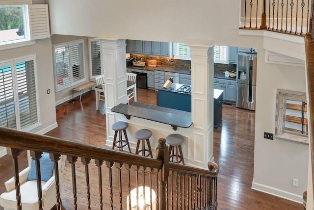106 Ashton Park Blvd, Franklin, TN 37067 - interior space featuring wood finished floors, plenty of natural light, baseboards, and ornate columns