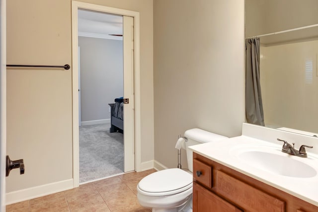 106 Ashton Park Blvd, Franklin, TN 37067 - bathroom featuring toilet, vanity, baseboards, and a shower with shower curtain