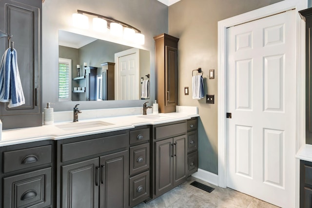 106 Ashton Park Blvd, Franklin, TN 37067 - bathroom with double vanity, baseboards, and ornamental molding