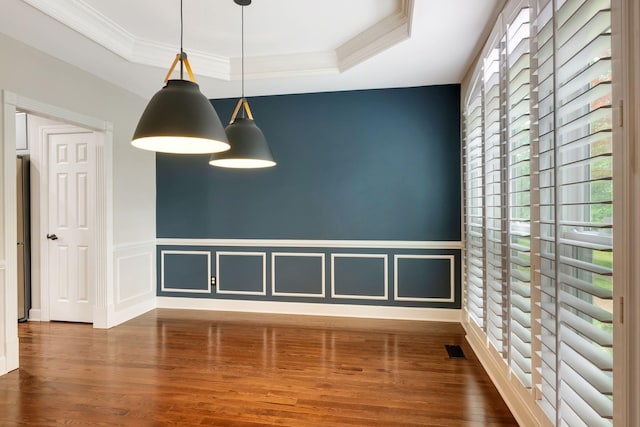 106 Ashton Park Blvd, Franklin, TN 37067 - spare room with a tray ceiling, wood finished floors, a wainscoted wall, crown molding, and a decorative wall