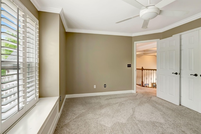 106 Ashton Park Blvd, Franklin, TN 37067 - unfurnished bedroom with light colored carpet, crown molding, baseboards, and a ceiling fan