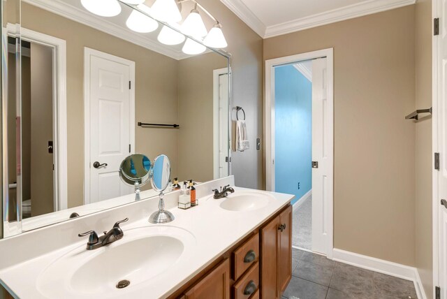106 Ashton Park Blvd, Franklin, TN 37067 - bathroom with double vanity, crown molding, tile patterned flooring, baseboards, and toilet