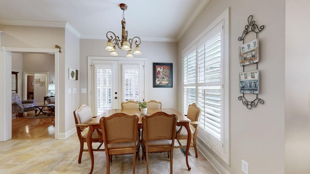 516 Letcher Ave, Lebanon, TN 37087 - dining space with a chandelier, crown molding, plenty of natural light, and baseboards