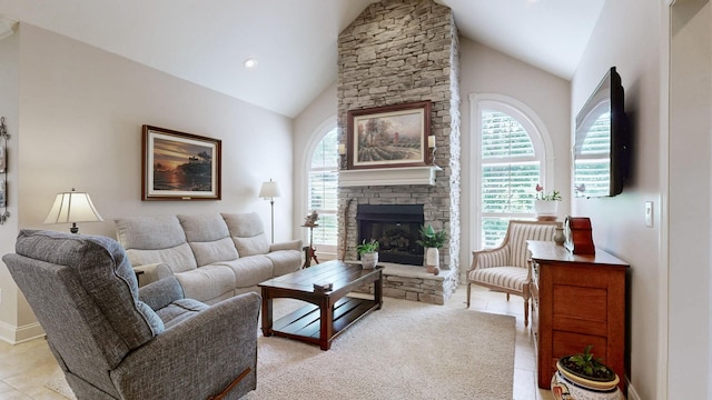 516 Letcher Ave, Lebanon, TN 37087 - living area featuring healthy amount of natural light, a fireplace, baseboards, and high vaulted ceiling