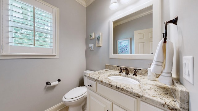 516 Letcher Ave, Lebanon, TN 37087 - half bathroom featuring vanity, crown molding, toilet, and baseboards