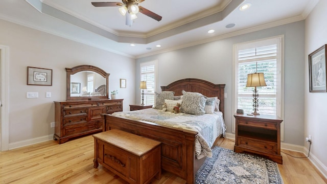516 Letcher Ave, Lebanon, TN 37087 - bedroom featuring light wood-type flooring, a tray ceiling, recessed lighting, ornamental molding, and baseboards