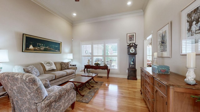516 Letcher Ave, Lebanon, TN 37087 - living room featuring healthy amount of natural light, ornamental molding, light wood-type flooring, baseboards, and recessed lighting