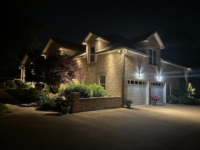 516 Letcher Ave, Lebanon, TN 37087 - view of front of property featuring concrete driveway and brick siding