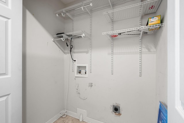 97 Whitefield Ln, Carthage, TN 37030 - laundry room with hookup for a washing machine, electric dryer hookup, and baseboards