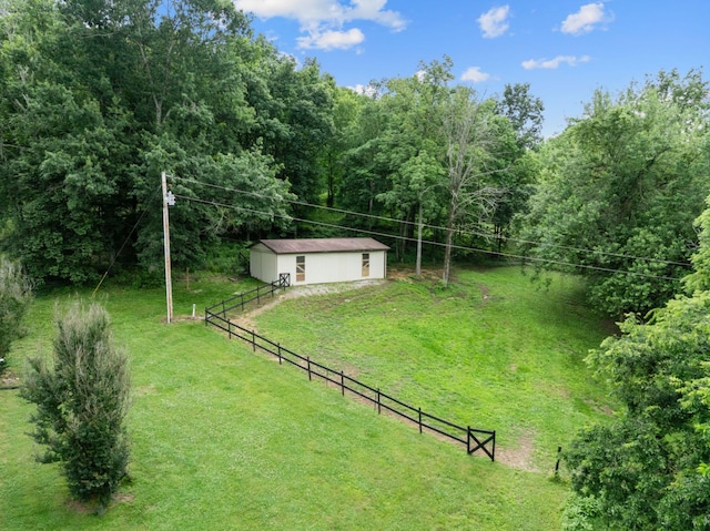 97 Whitefield Ln, Carthage, TN 37030 - view of yard featuring an outdoor structure, an outbuilding, and a wooded view