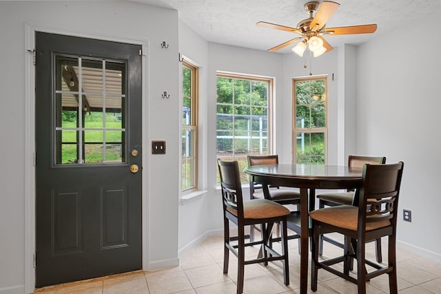 97 Whitefield Ln, Carthage, TN 37030 - dining space with a ceiling fan, light tile patterned flooring, baseboards, and a textured ceiling