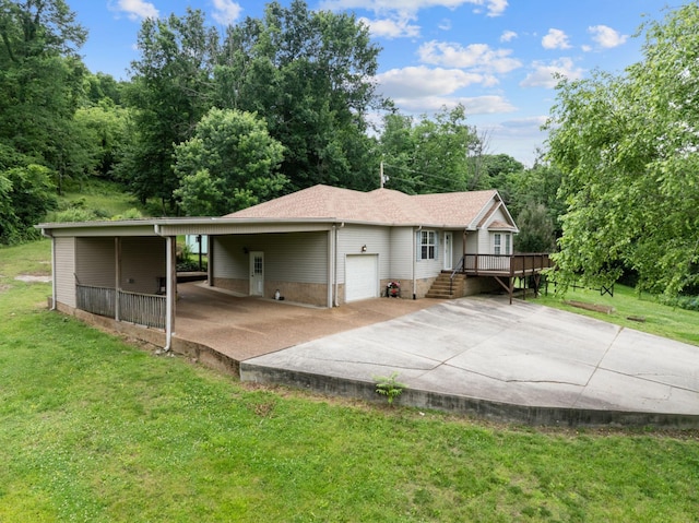 97 Whitefield Ln, Carthage, TN 37030 - rear view of property with a yard, a wooden deck, a garage, and concrete driveway