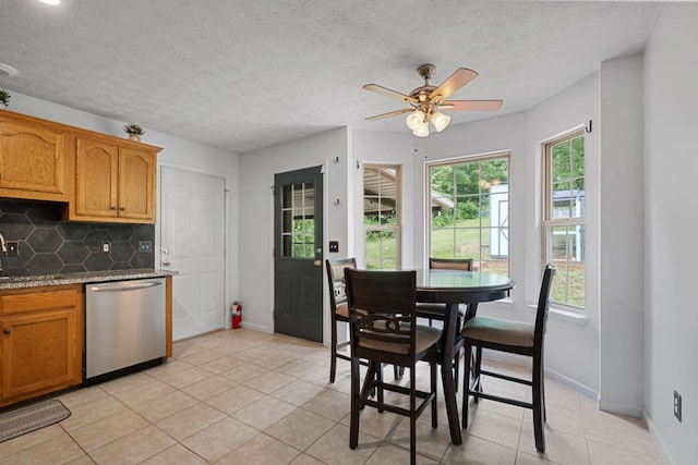 97 Whitefield Ln, Carthage, TN 37030 - kitchen with dishwasher, backsplash, light tile patterned flooring, a ceiling fan, and baseboards