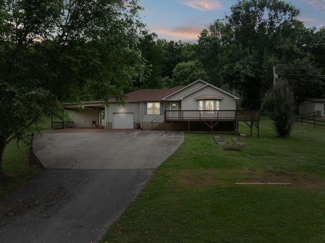 97 Whitefield Ln, Carthage, TN 37030 - ranch-style home featuring a garage, a front yard, asphalt driveway, a deck, and a carport