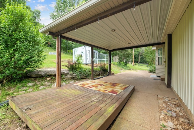 97 Whitefield Ln, Carthage, TN 37030 - wooden terrace with a carport and a patio area