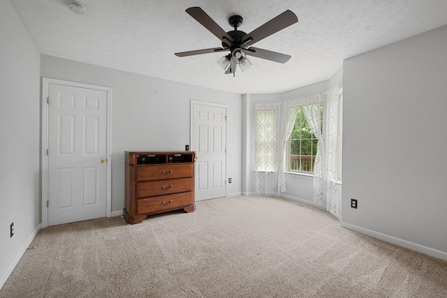 97 Whitefield Ln, Carthage, TN 37030 - bedroom featuring carpet floors, baseboards, a ceiling fan, and a textured ceiling