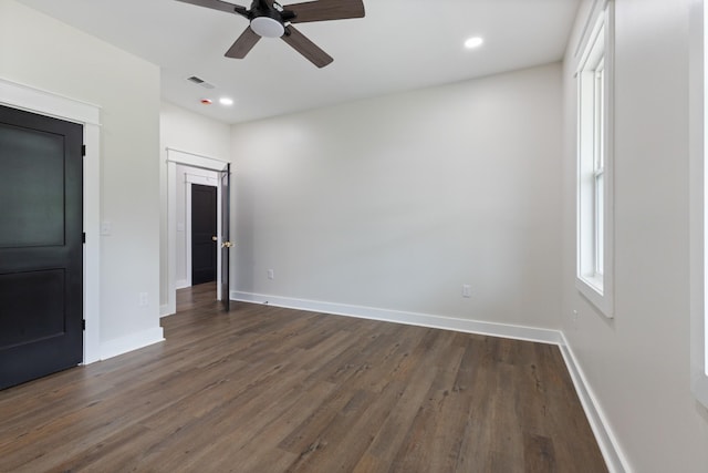 312 N Main St, Dickson, TN 37055 - unfurnished bedroom with baseboards, dark wood-type flooring, a ceiling fan, and recessed lighting