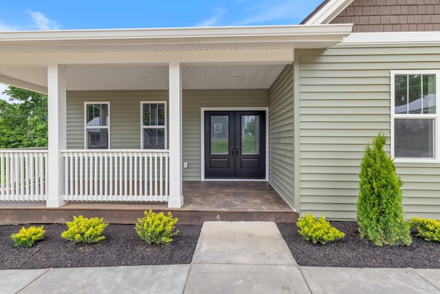 312 N Main St, Dickson, TN 37055 - doorway to property featuring french doors and a porch