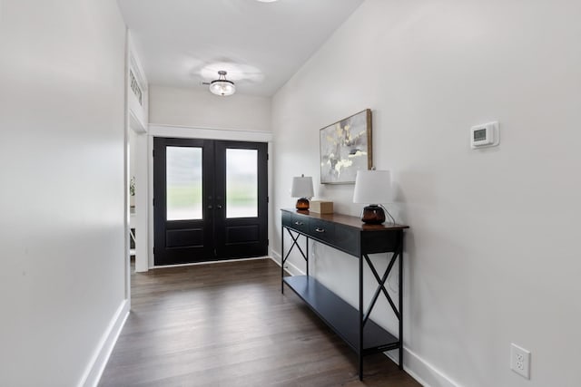 312 N Main St, Dickson, TN 37055 - foyer entrance with baseboards, wood finished floors, and french doors