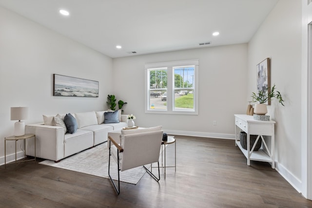 312 N Main St, Dickson, TN 37055 - living room featuring dark wood-style flooring, baseboards, and recessed lighting