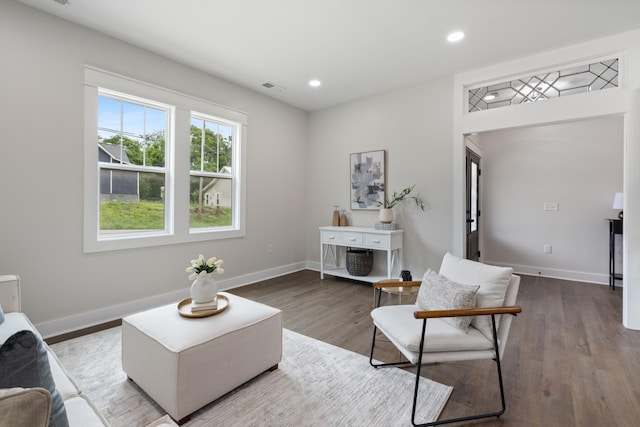 312 N Main St, Dickson, TN 37055 - living room featuring wood finished floors, baseboards, and recessed lighting