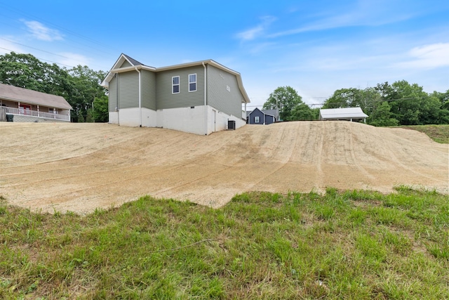 312 N Main St, Dickson, TN 37055 - view of side of home featuring driveway