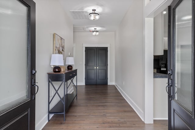 312 N Main St, Dickson, TN 37055 - foyer entrance featuring wood finished floors and baseboards