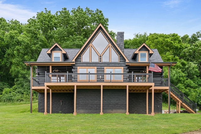 2223 Simmons Ridge Rd, Cornersville, TN 37047 - back of property featuring a wooden deck, log exterior, a lawn, and stairway
