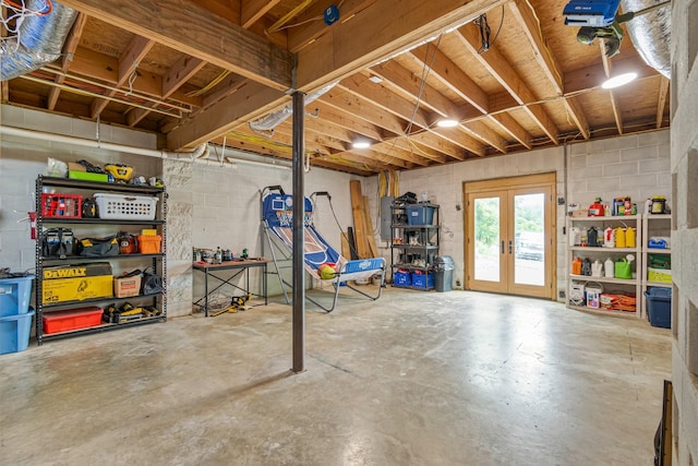 2223 Simmons Ridge Rd, Cornersville, TN 37047 - basement featuring concrete block wall and french doors