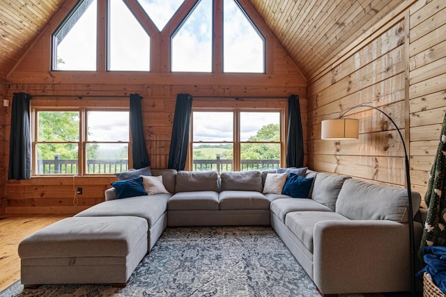 2223 Simmons Ridge Rd, Cornersville, TN 37047 - living area with wooden walls, wood ceiling, healthy amount of natural light, high vaulted ceiling, and wood finished floors