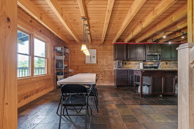 2223 Simmons Ridge Rd, Cornersville, TN 37047 - dining area with stone tile flooring, rail lighting, wood ceiling with exposed beams, and wooden walls