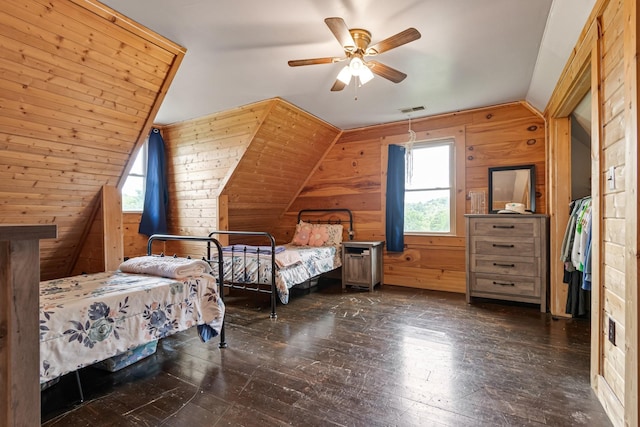 2223 Simmons Ridge Rd, Cornersville, TN 37047 - bedroom featuring wood walls, vaulted ceiling, hardwood / wood-style flooring, and a ceiling fan