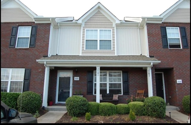 4050 George Buchanan Dr, La Vergne, TN 37086 - multi unit property featuring a porch and brick siding
