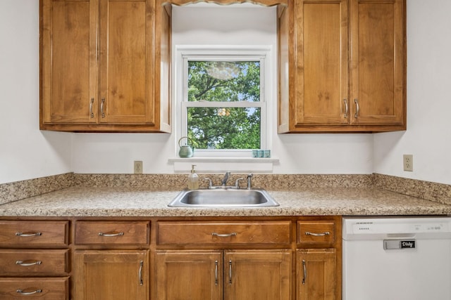 511 Jones St Unit C3, Old Hickory, TN 37138 - kitchen with white dishwasher, a sink, light countertops, and brown cabinetry