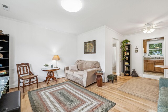 511 Jones St Unit C3, Old Hickory, TN 37138 - living room with light wood-type flooring, crown molding, and a ceiling fan