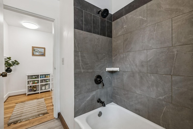 511 Jones St Unit C3, Old Hickory, TN 37138 - bathroom featuring wood finished floors, tub / shower combination, and baseboards
