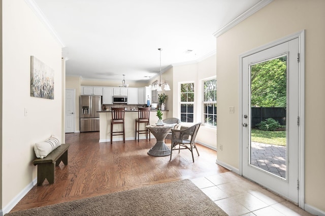 3113 Friars Bridge Pass, Franklin, TN 37064 - dining room featuring ornamental molding, a chandelier, and baseboards