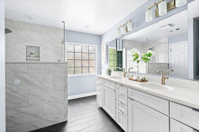 3113 Friars Bridge Pass, Franklin, TN 37064 - full bathroom with double vanity, a walk in shower, and baseboards