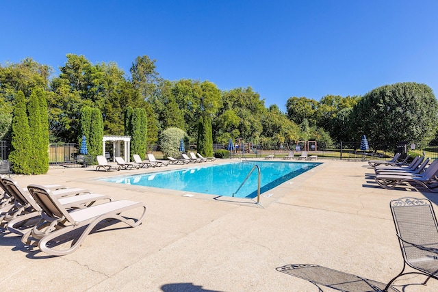 3113 Friars Bridge Pass, Franklin, TN 37064 - community pool with a patio and view of scattered trees