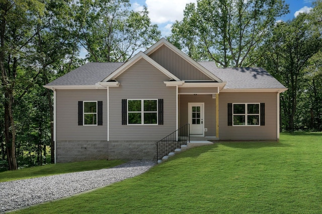 766 Billy Wynn Rd, Dickson, TN 37055 - view of front of house with a front lawn, roof with shingles, and board and batten siding