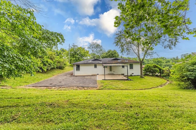 4044 Brick Church Pike, Nashville, TN 37207 - rear view of property with a patio and a yard