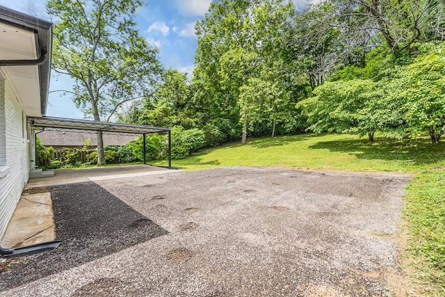 4044 Brick Church Pike, Nashville, TN 37207 - view of grassy yard featuring a carport and driveway