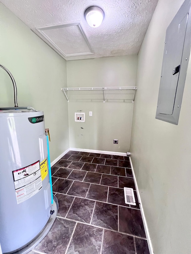 783 Galen Rd, Lafayette, TN 37083 - washroom with water heater, washer hookup, electric panel, a textured ceiling, and baseboards