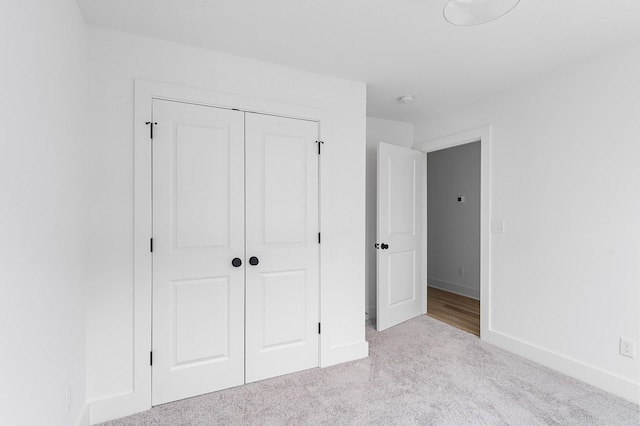 726 N Dupont Ave, Madison, TN 37115 - unfurnished bedroom with carpet, a closet, and baseboards