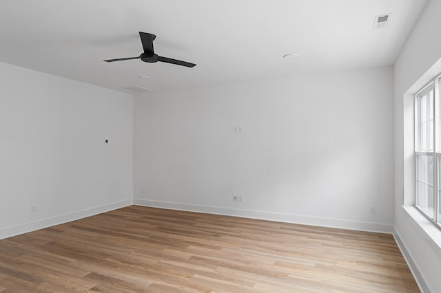 726 N Dupont Ave, Madison, TN 37115 - spare room with light wood-type flooring, plenty of natural light, a ceiling fan, and baseboards