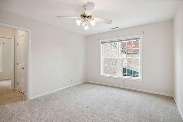 517 Ridgestone Dr, Franklin, TN 37064 - empty room featuring light carpet, baseboards, and ceiling fan
