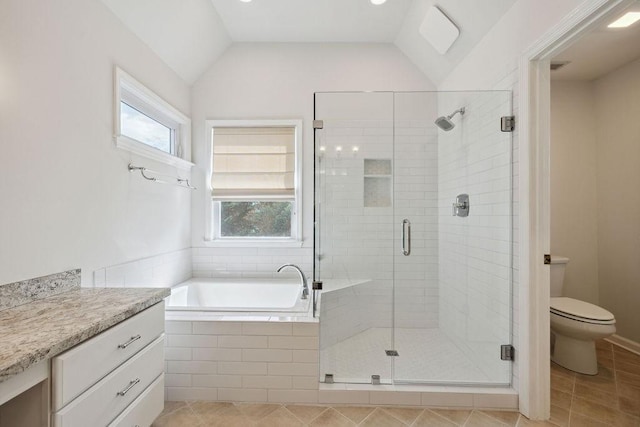 517 Ridgestone Dr, Franklin, TN 37064 - bathroom with toilet, a shower stall, a garden tub, tile patterned floors, and lofted ceiling