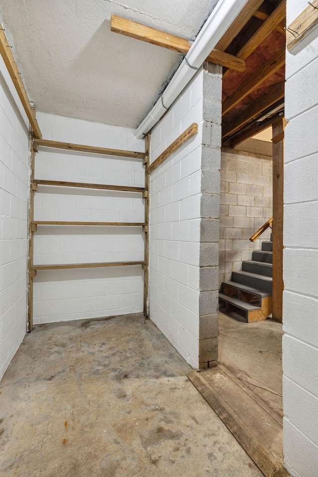 517 Ridgestone Dr, Franklin, TN 37064 - below grade area featuring stairway and concrete block wall