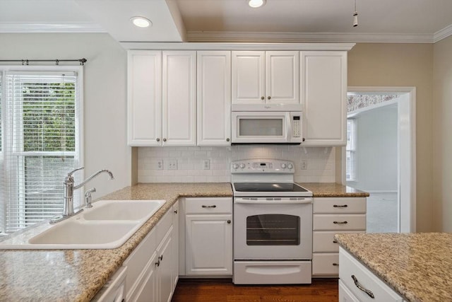 517 Ridgestone Dr, Franklin, TN 37064 - kitchen featuring white appliances, a sink, crown molding, white cabinets, and recessed lighting